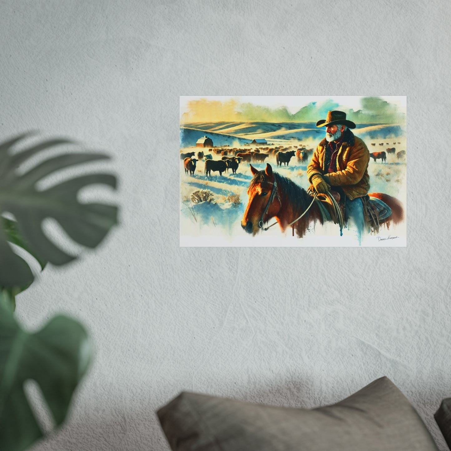 Painting of a cowboy on horseback with cattle in the background, displayed on a wall.