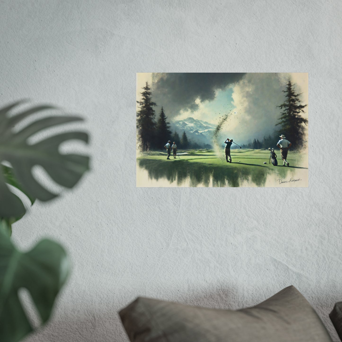 Poster of a golf scene on a wall with a plant and pillow in the foreground.