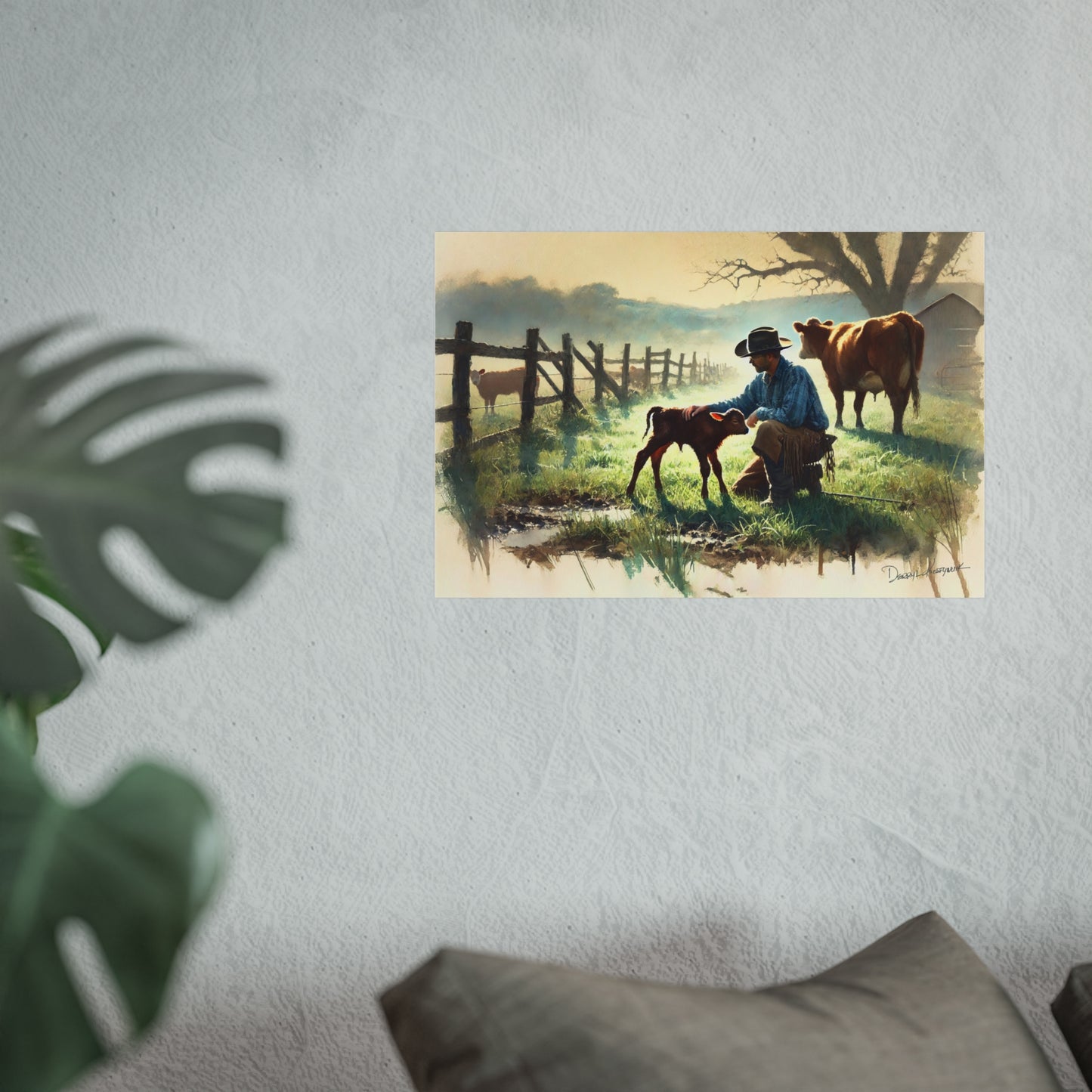 Poster of a cowboy with a cow and calf in a pastoral scene on a wall.