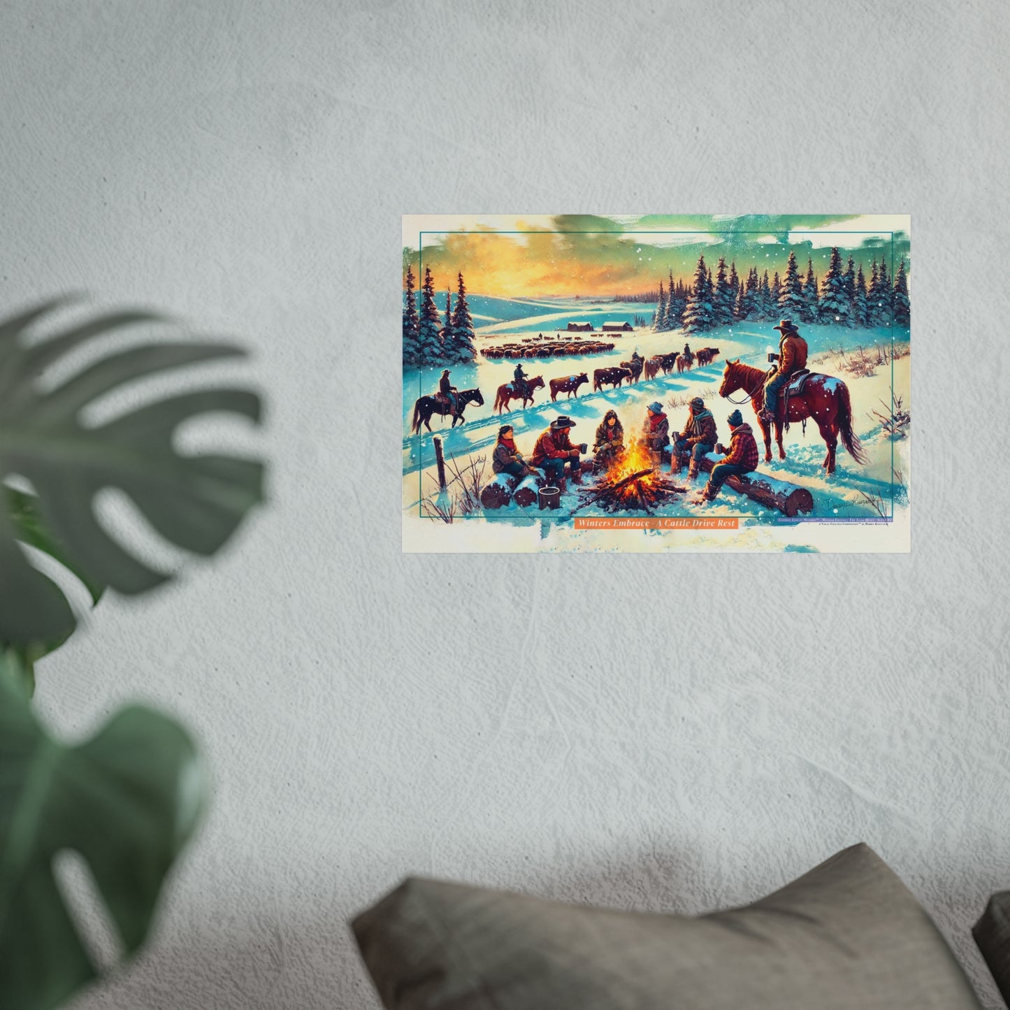 Poster of cowboys around a campfire with horses in a snowy landscape on a wall.