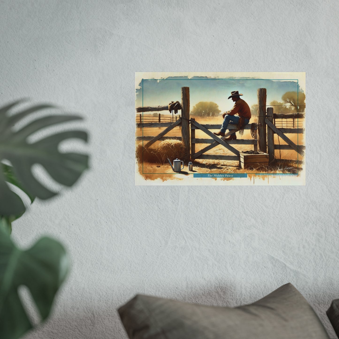 Poster of a cowboy on a fence with a plant and pillow in the foreground