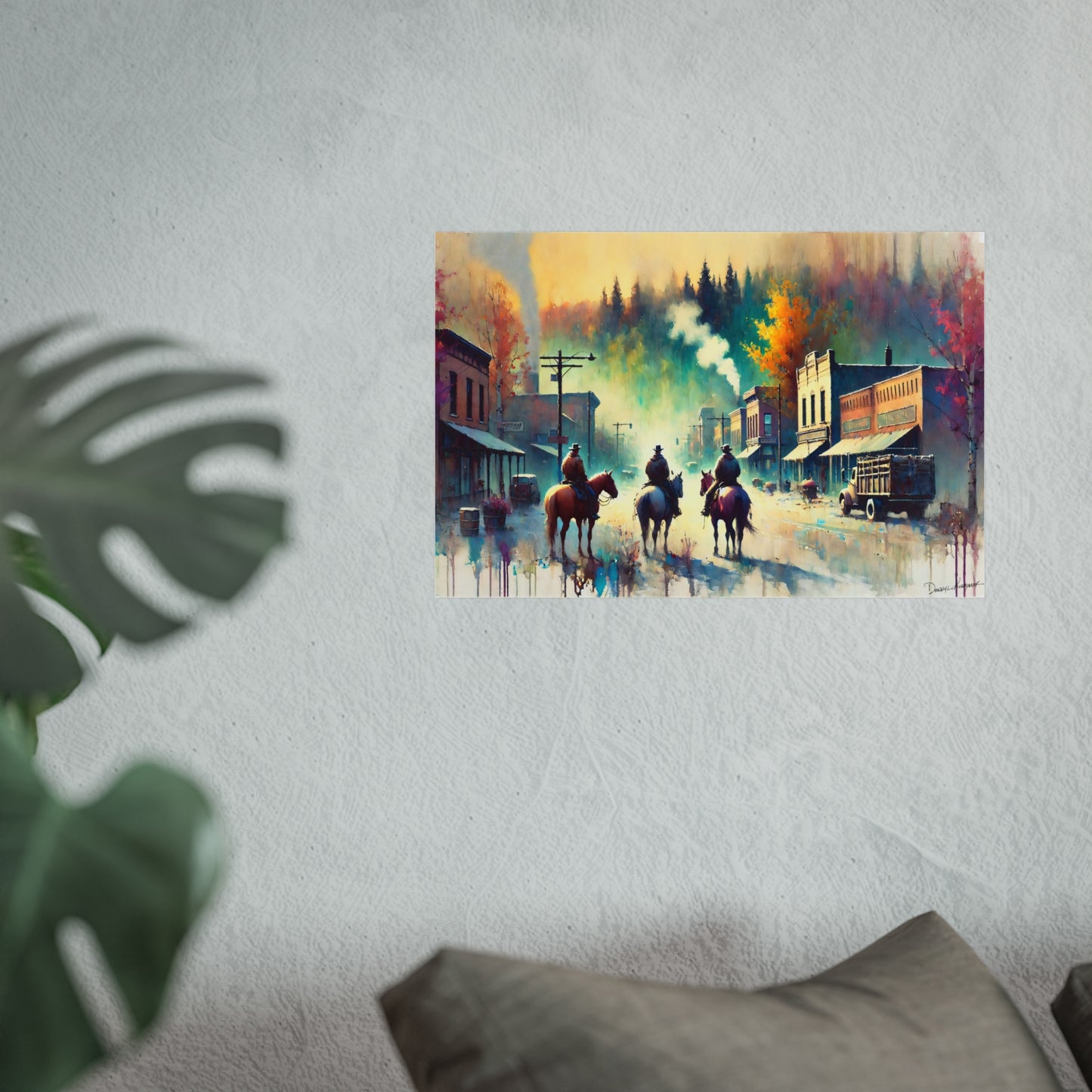 Painting of cowboys on horses in a town setting on a wall.