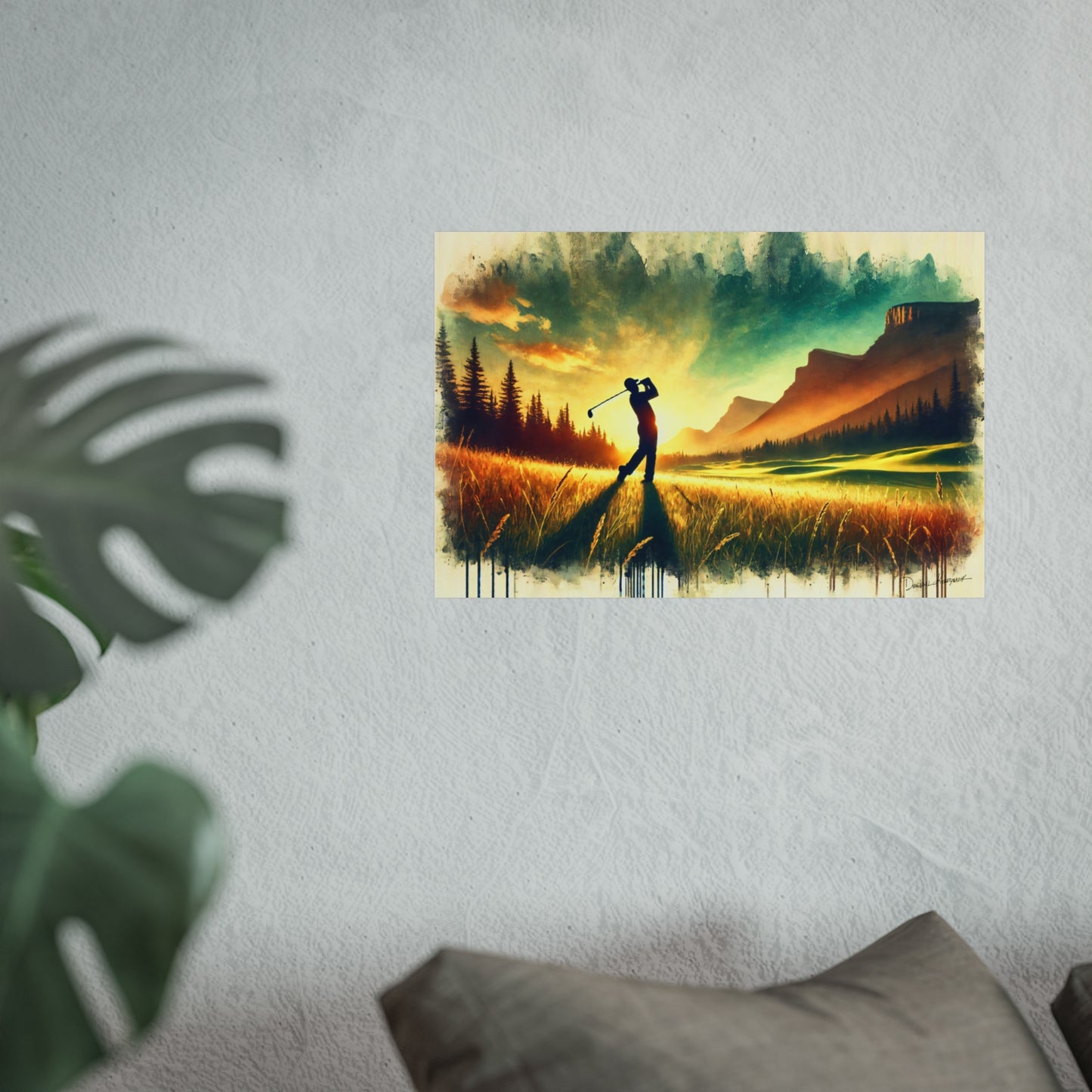 Giclee print of a golfer on a golf course with mountains in the background, displayed on a wall.