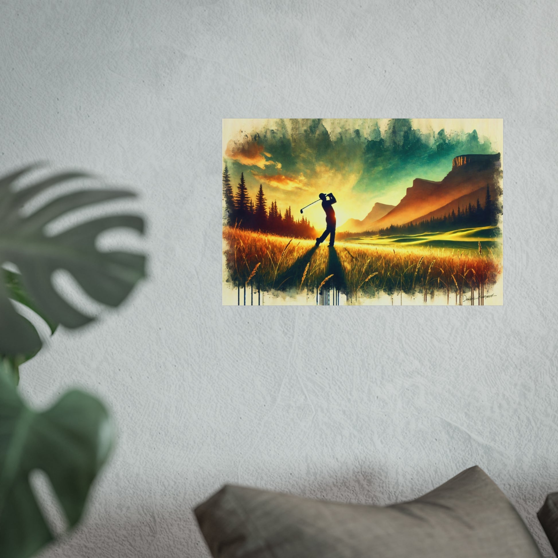 Giclee print of a golfer on a golf course with mountains in the background, displayed on a wall.